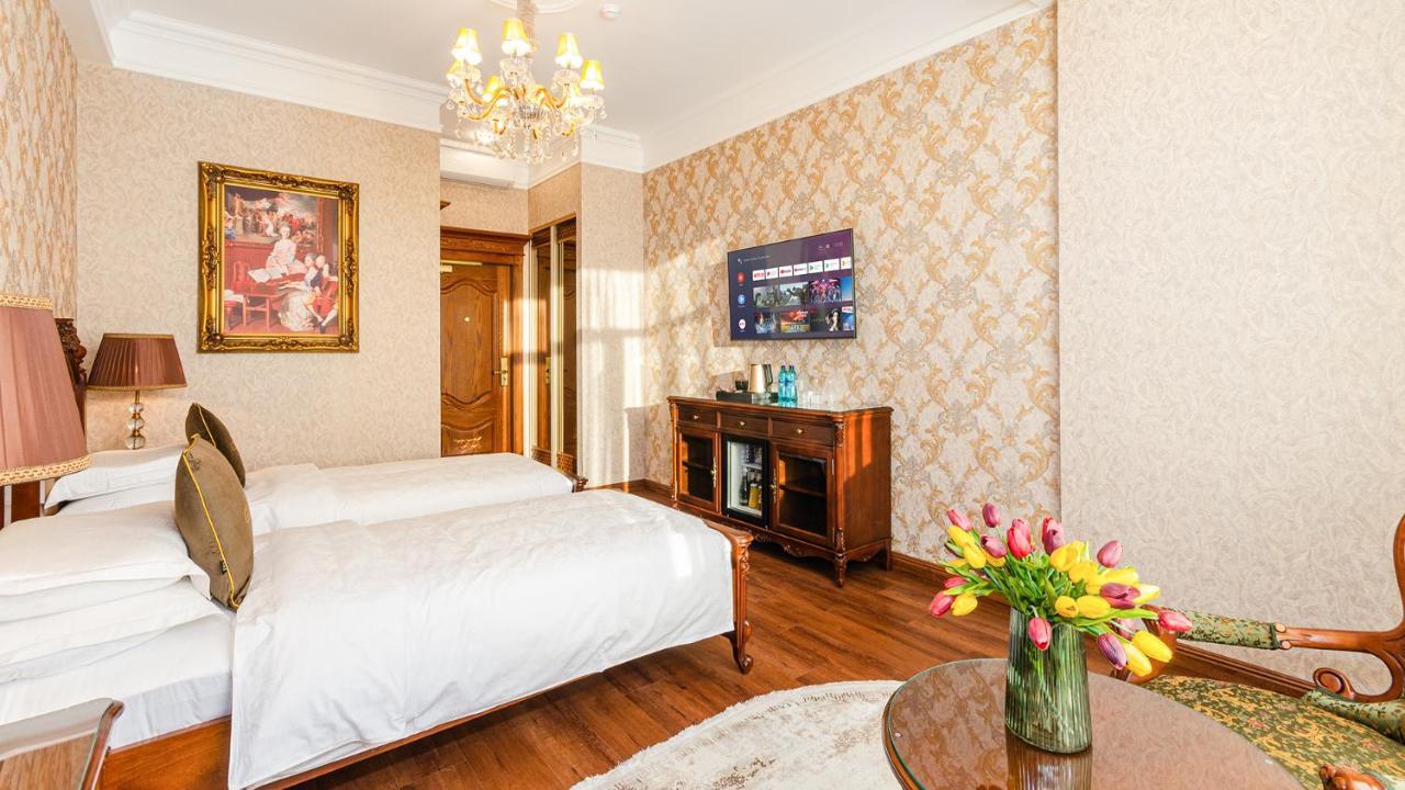 Gregory Boutique Hotel צ'יסינאו מראה חיצוני תמונה A room at the hotel